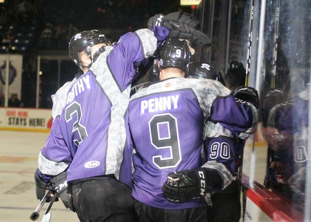 Matt Willows gets (90) gets congratulated by Chris McCarthy, Ryan Penny and Frank Hora after his 3rd period goal.