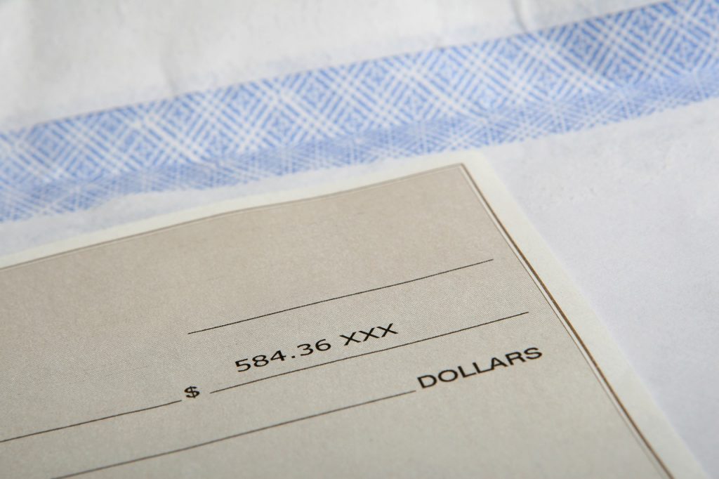 Understanding taxes when a family member signs the paycheck