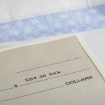 Understanding taxes when a family member signs the paycheck