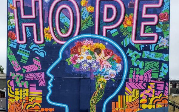 Illuminating HOPE: Threshold Plans Rededication of Hope Blossoms Mural for Sept. 19